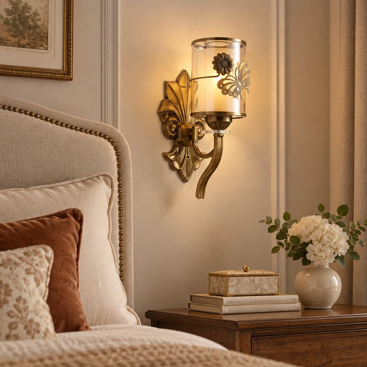 Floral cylinder wall sconce beside a bed