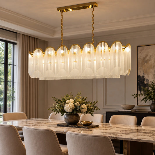 Scalloped frosted-glass chandelier above a dining table
