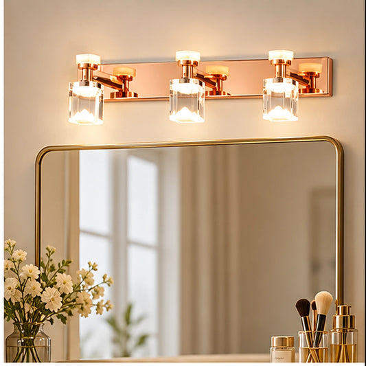 Three-cube vanity light above a mirror