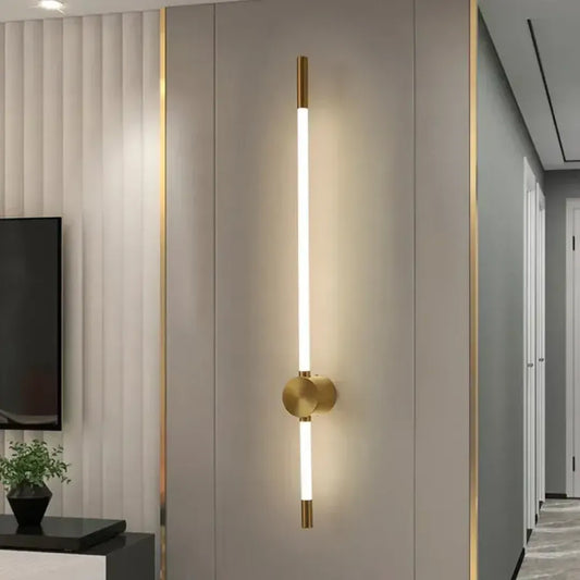 Gold linear LED wall light in a hallway