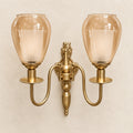 Bliss & Birch Twin Amber Tulip-Shade Wall Sconce - Full two-arm sconce, each shade with amber outer glass and frosted inner glass - styled from supplied real product photo