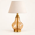 Amber glass and gold table lamp - hero