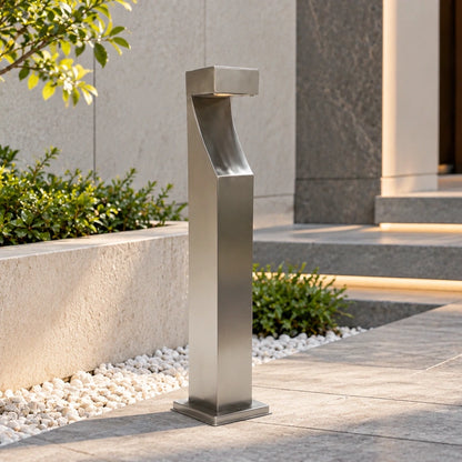 Curved-head stainless steel bollard at a villa entrance