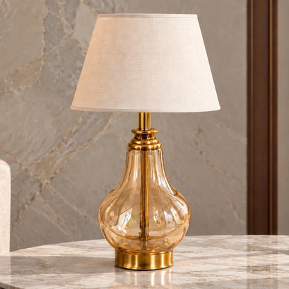 Amber glass table lamp in a living-room setting
