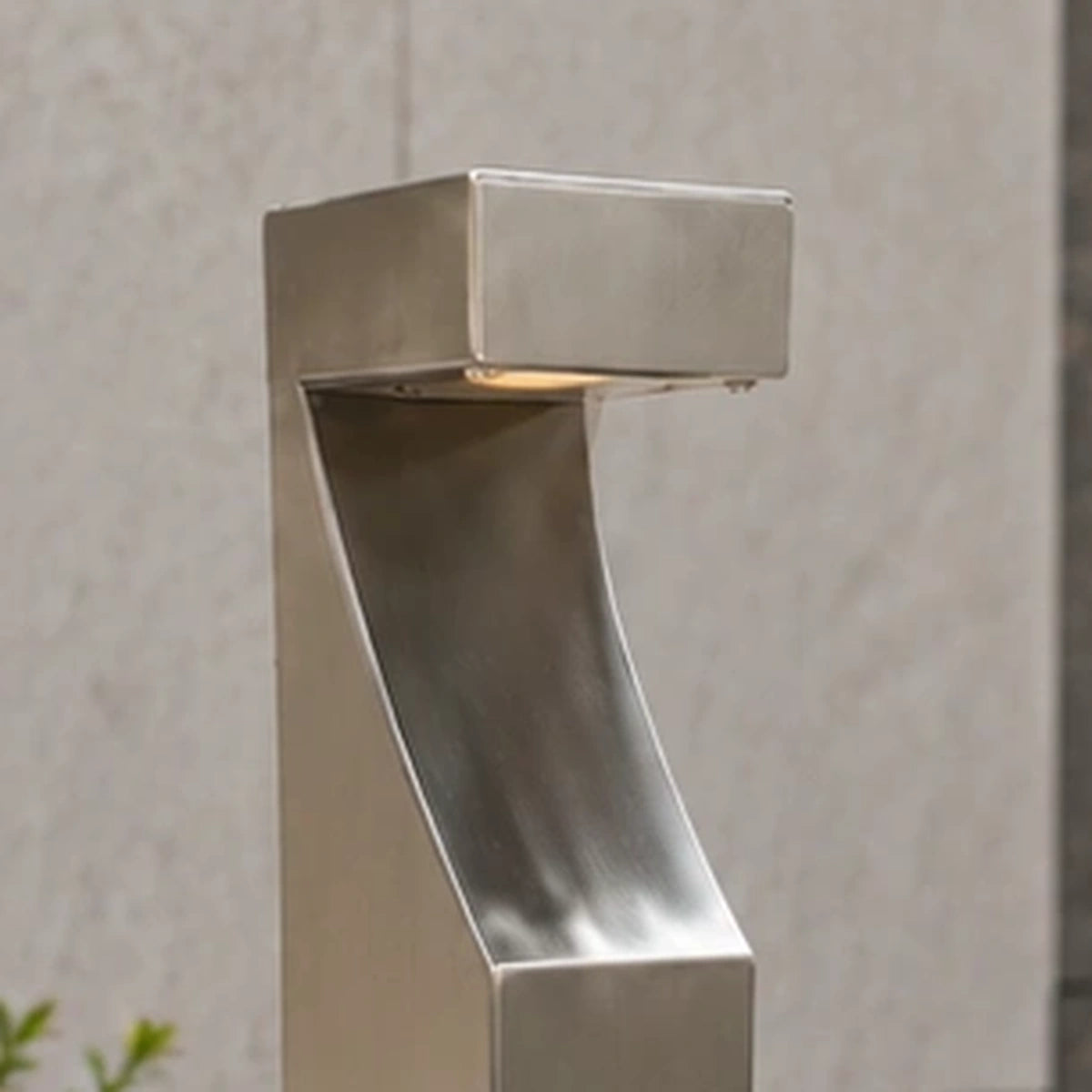 Close-up of the curved neck and downward-facing top housing