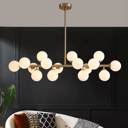 Opulent Glow sixteen-globe chandelier against a dark wall