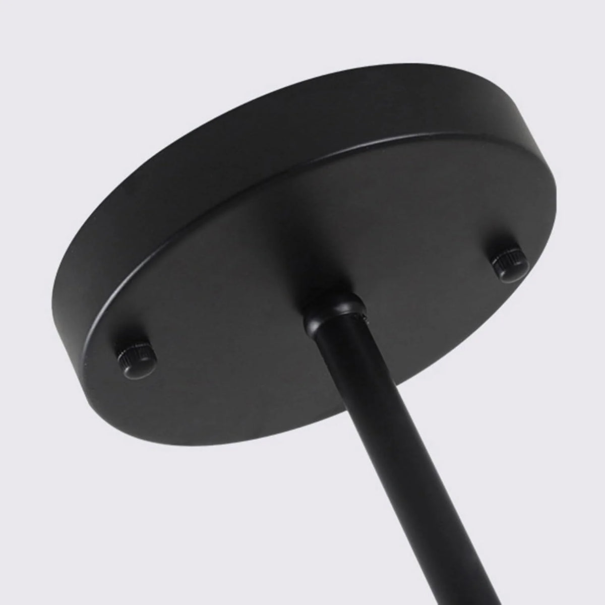 Close-up of the black round canopy and downrod