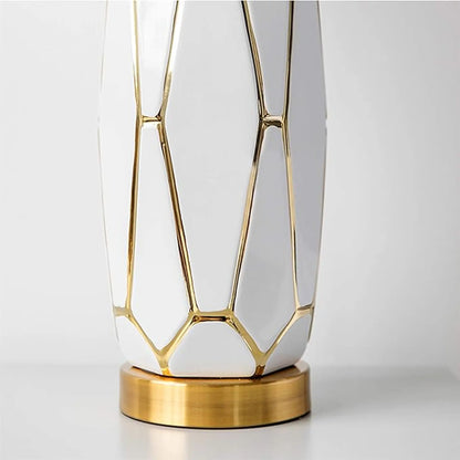 Close-up of the Carter table lamp faceted body and gold-toned base