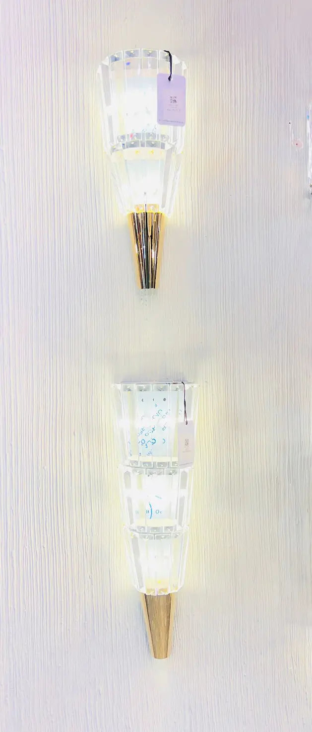 Pair of Aurora Luxe crystal wall sconces installed vertically