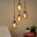 Amber Glass four-light cluster pendant in a room setting