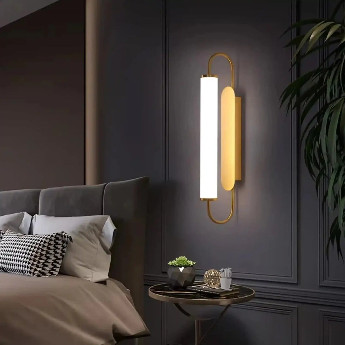 Modern linear LED wall light beside a bed