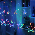 Multicolour star curtain string lights in a window