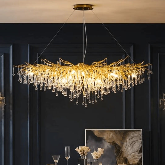 Golden tree branch crystal chandelier installed room view