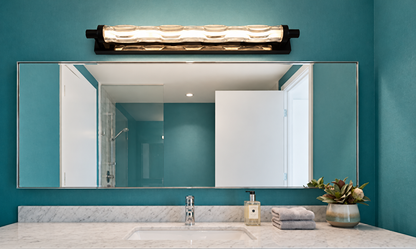 Illustrative black faceted-glass light above a mirror; source-based edited scene
