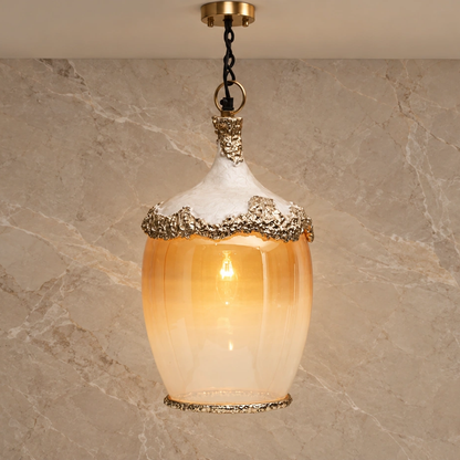 Illuminated 922003 pendant showing its single bulb and amber ribbed glass