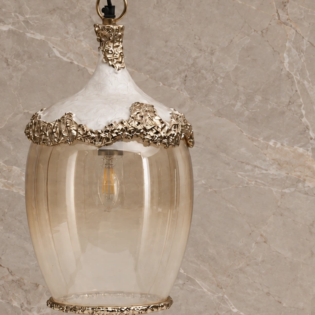Close view of the textured white shoulder and ornate antique-gold trim