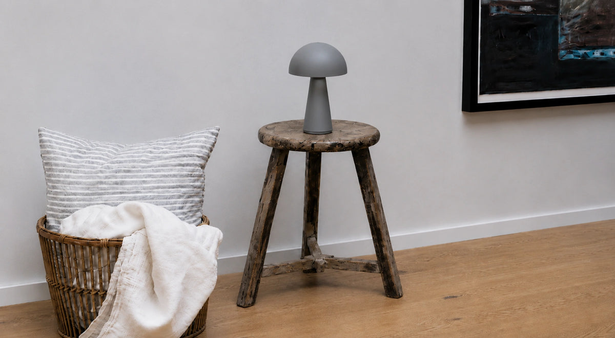 Supplier-provided room styling view of the grey dome table lamp