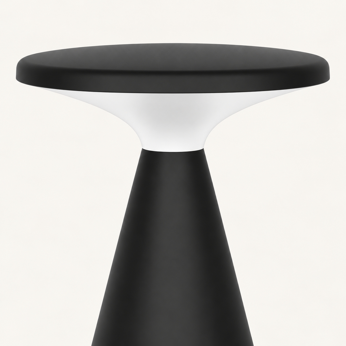 Detail of the flat black disc and white diffuser junction