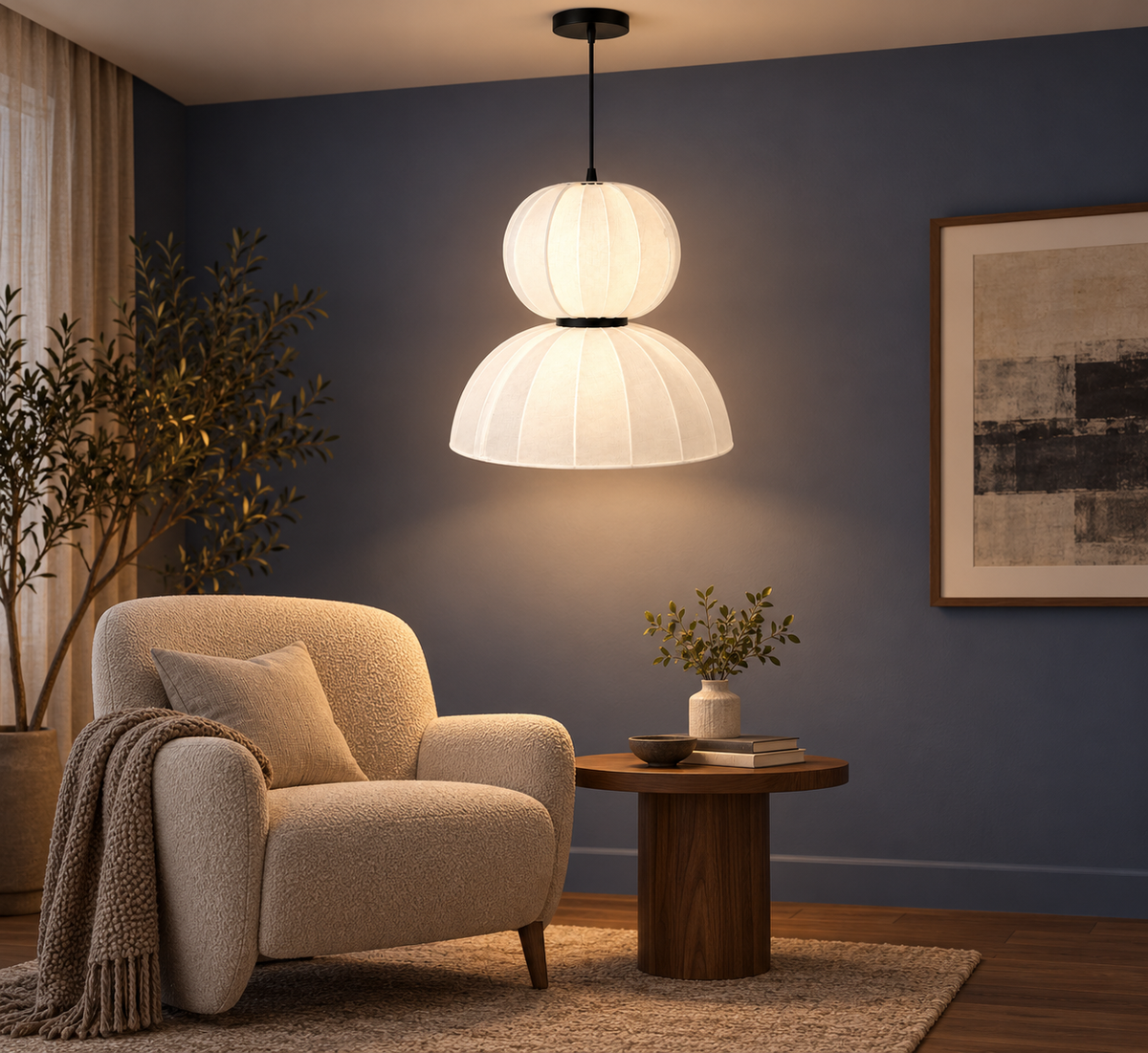 Two-tier white pendant beside an armchair over a side table
