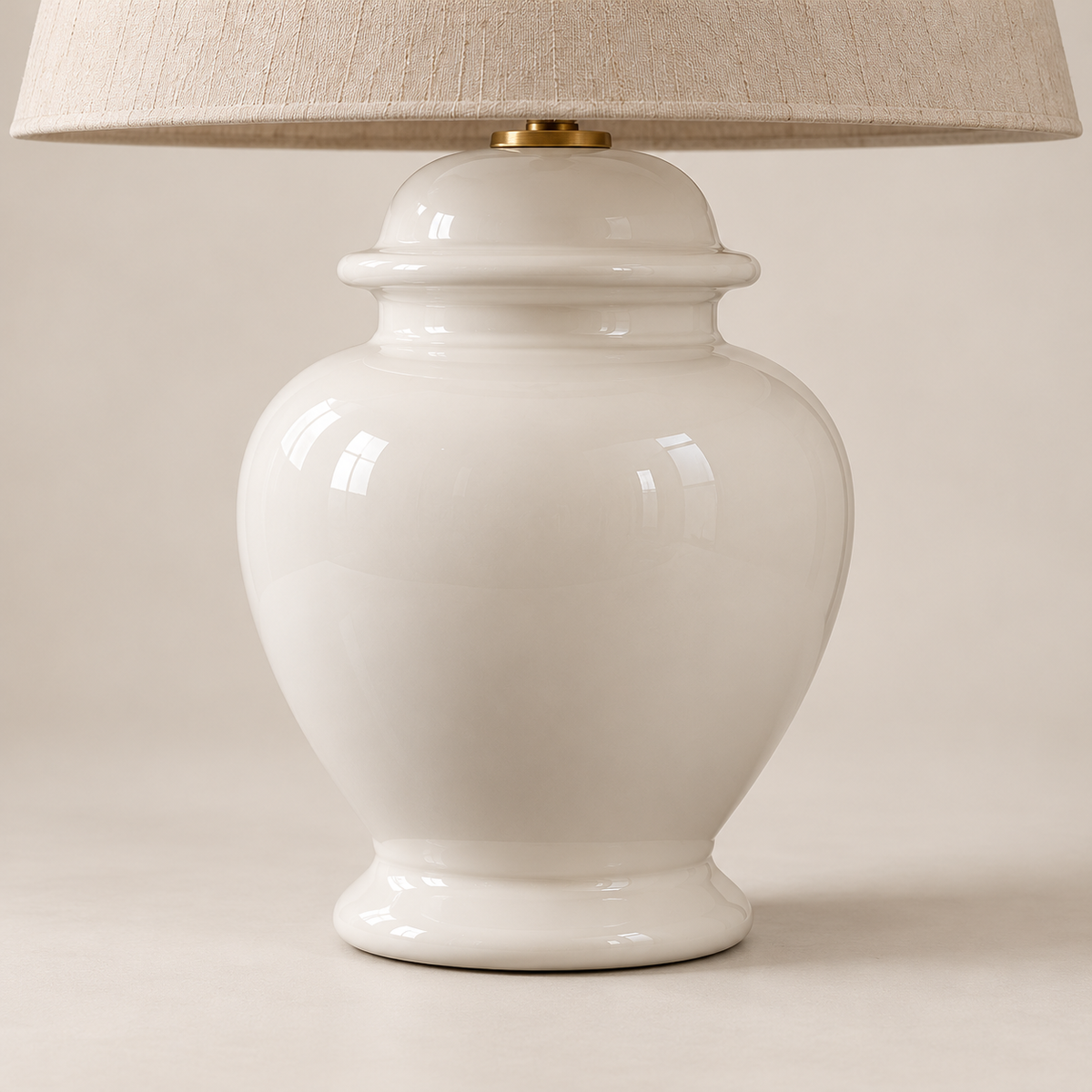 Glossy white ceramic urn body, ringed neck and rounded foot detail
