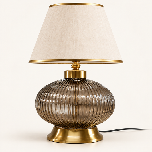 Smoke ribbed-glass globe table lamp with cream shade and gold-finish trim