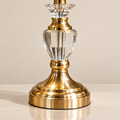 Detail of the faceted clear crystal centre and polished gold-finish base