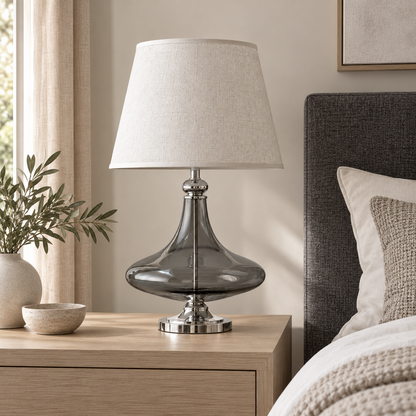 Generated bedside styling of the sculpted smoke glass and chrome table lamp