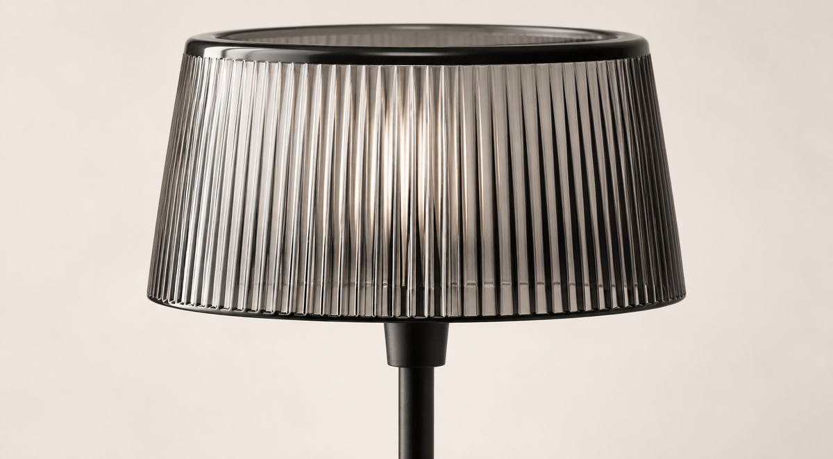 Close view of the Noir Ribbed table lamp translucent vertically ribbed shade