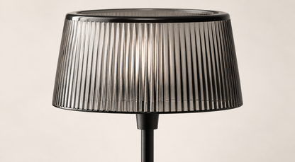 Close view of the Noir Ribbed table lamp translucent vertically ribbed shade