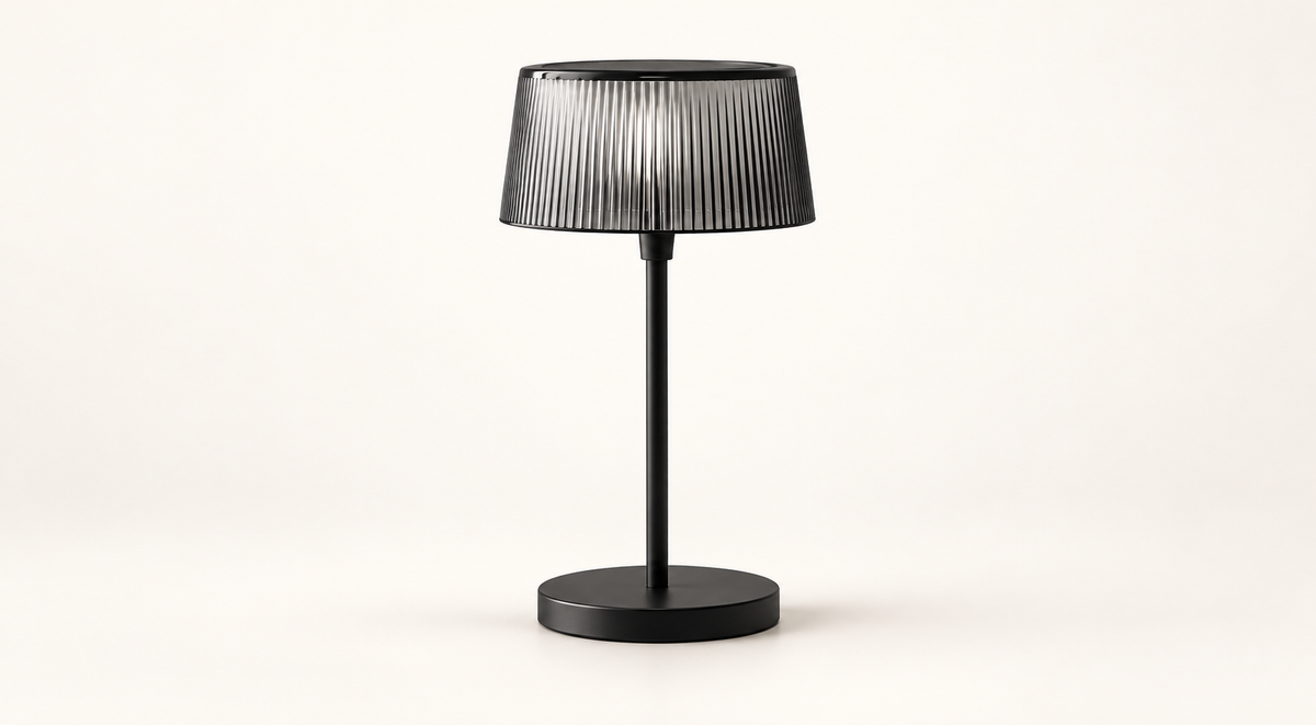 Noir Ribbed table lamp with smoke-black shade and matte-black base