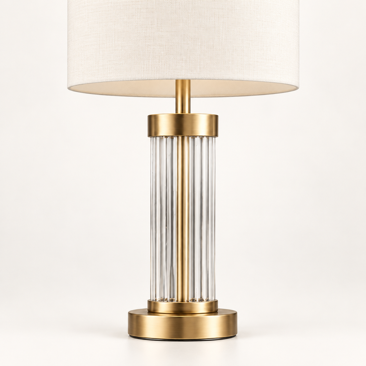 Close view of the Aurelia table lamp clear crystal rods and gold-finish frame