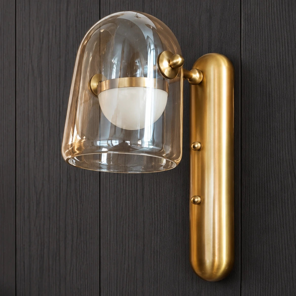 Clear glass and brushed-gold capsule wall light