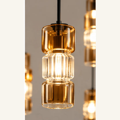 Close-up of amber cylindrical glass shade and ribbed inner diffuser