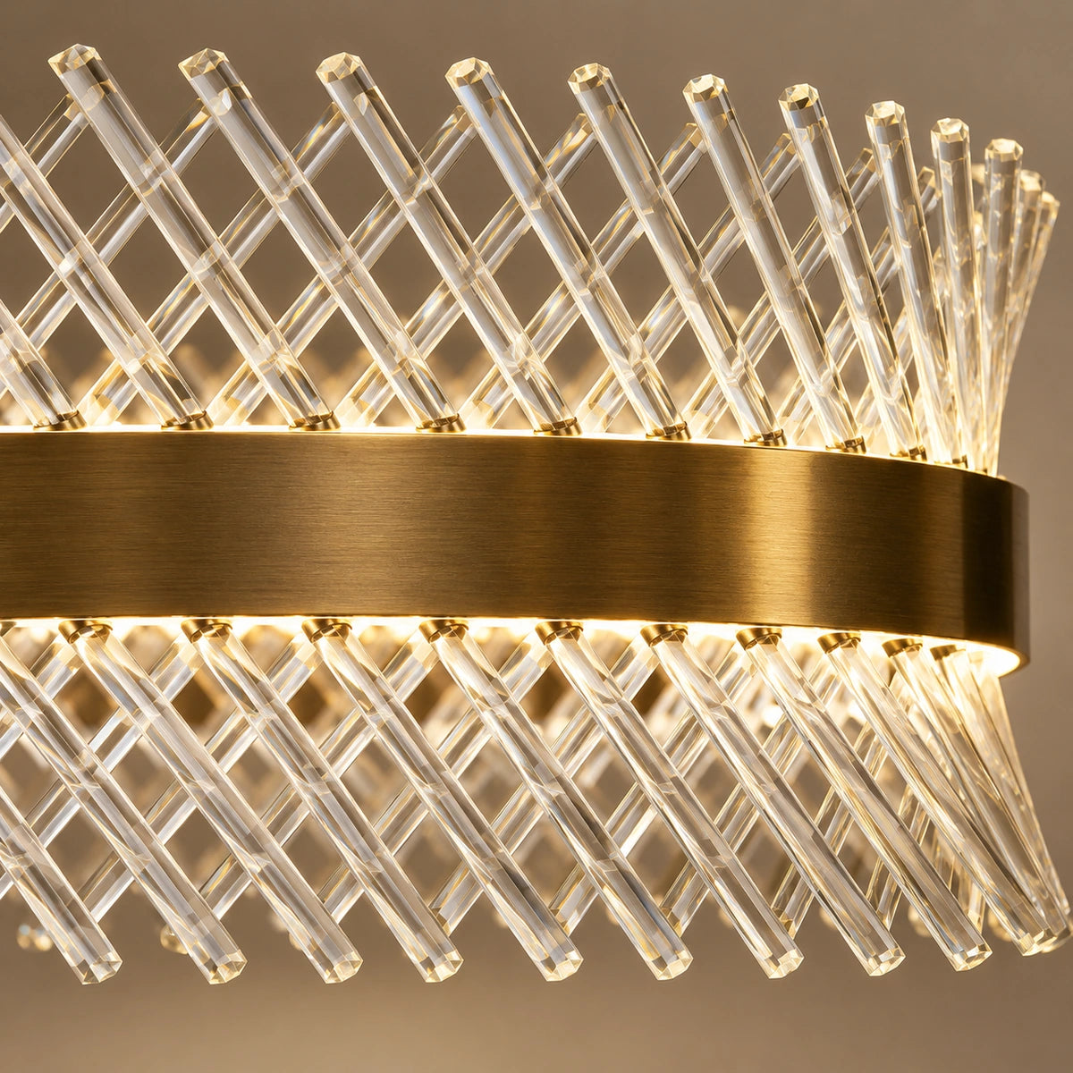 Close-up of antique-brass band and crossed clear crystal rods