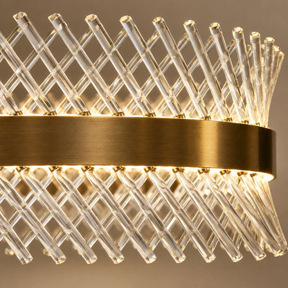 Close-up of antique-brass band and crossed clear crystal rods