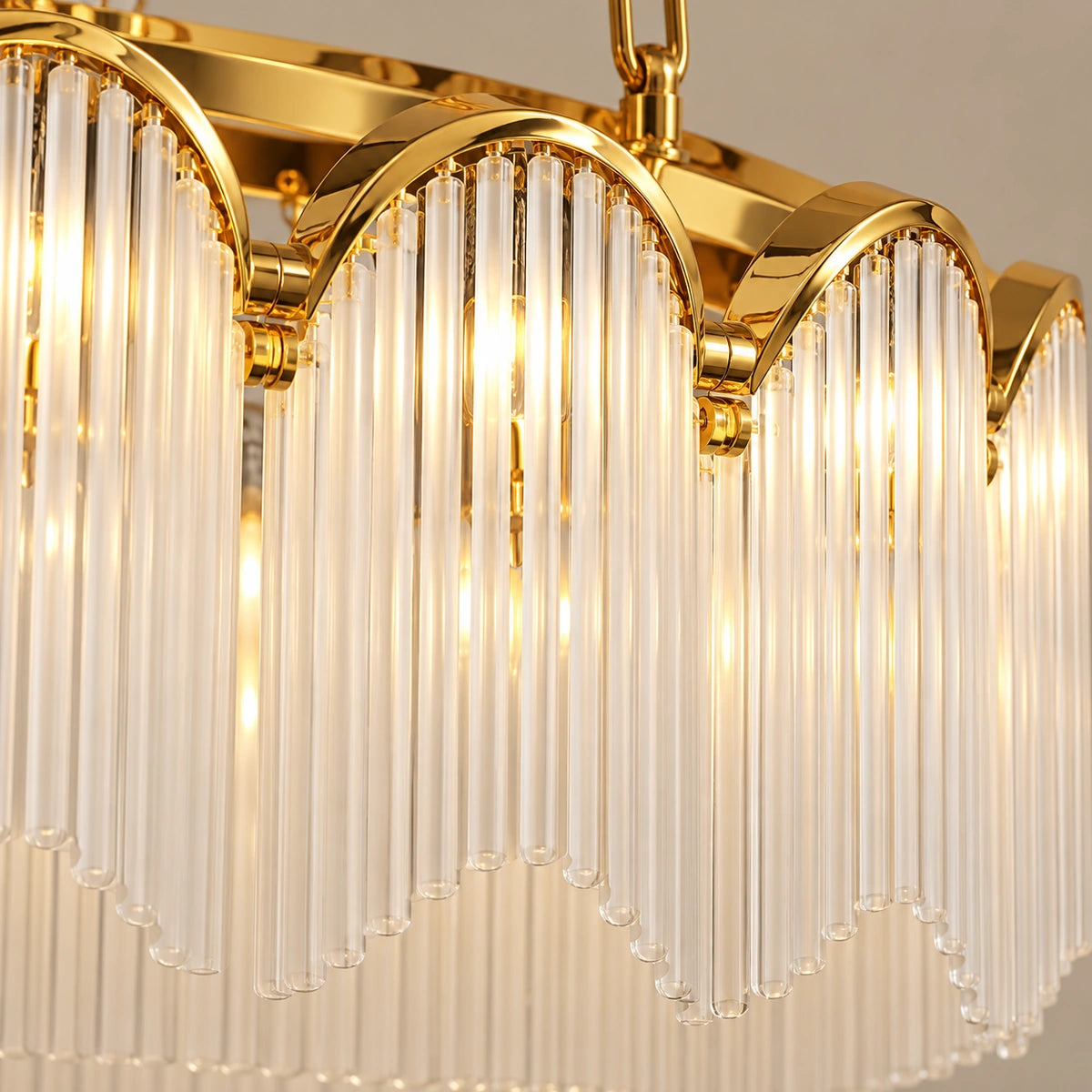 Close-up of gold scallops and vertically ribbed frosted glass