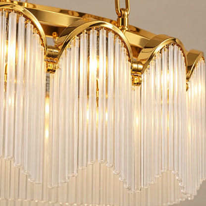 Close-up of gold scallops and vertically ribbed frosted glass