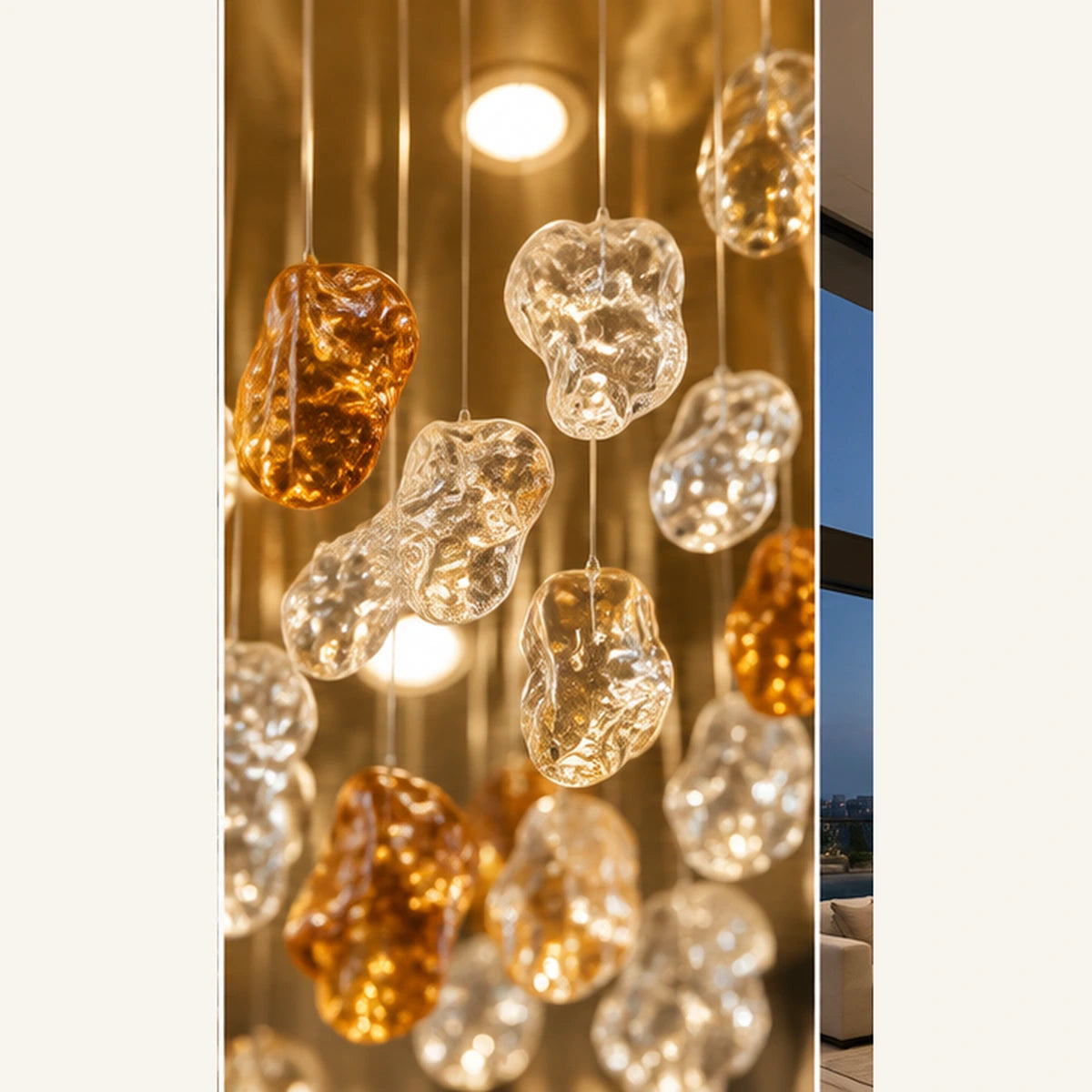 Close-up of irregular amber and clear glass droplets
