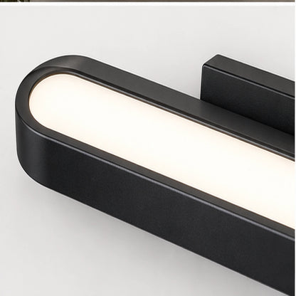 Close-up of the rounded black housing, white diffuser and centred mount