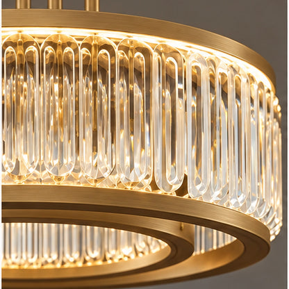 Close-up of rounded crystal prisms and antique brass ring