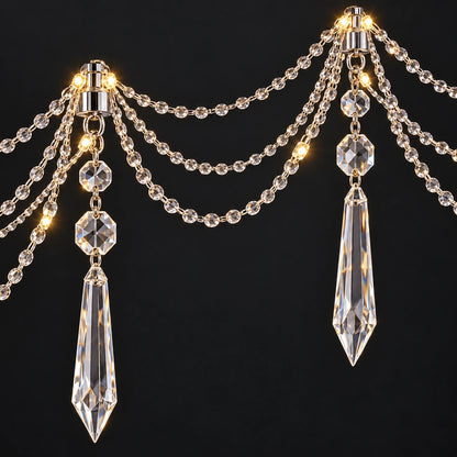 Close-up of clear bead swags, chrome peaks and crystal spear drops