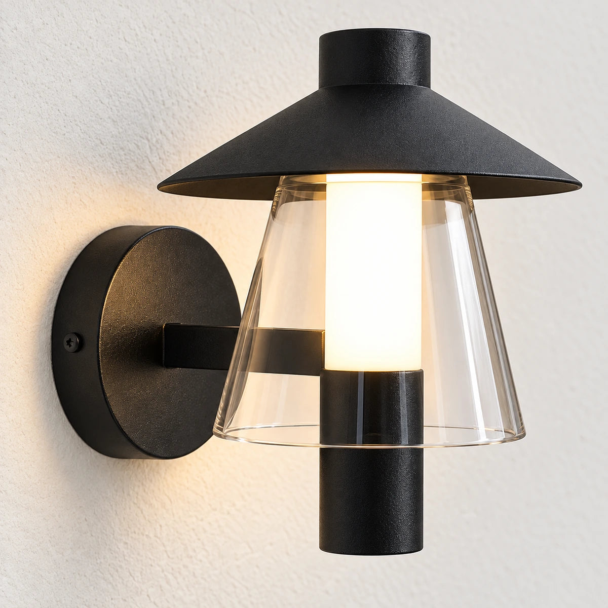 Close-up of the hood, luminous core, acrylic skirt, arm and wall mount