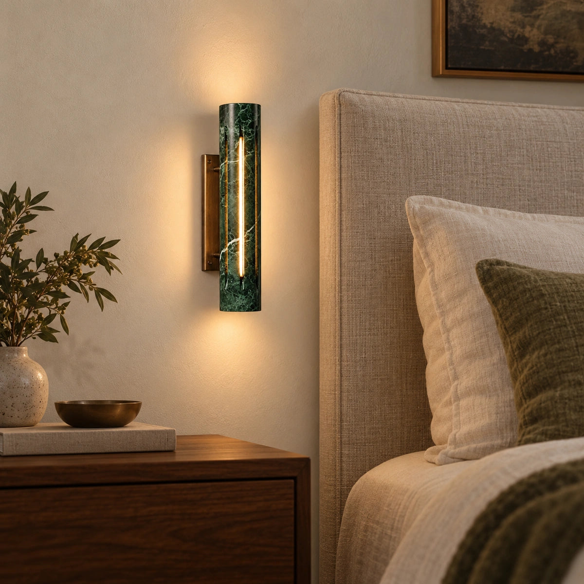 Cylo Green marble wall lamp — styled bedroom view with antique brass mount