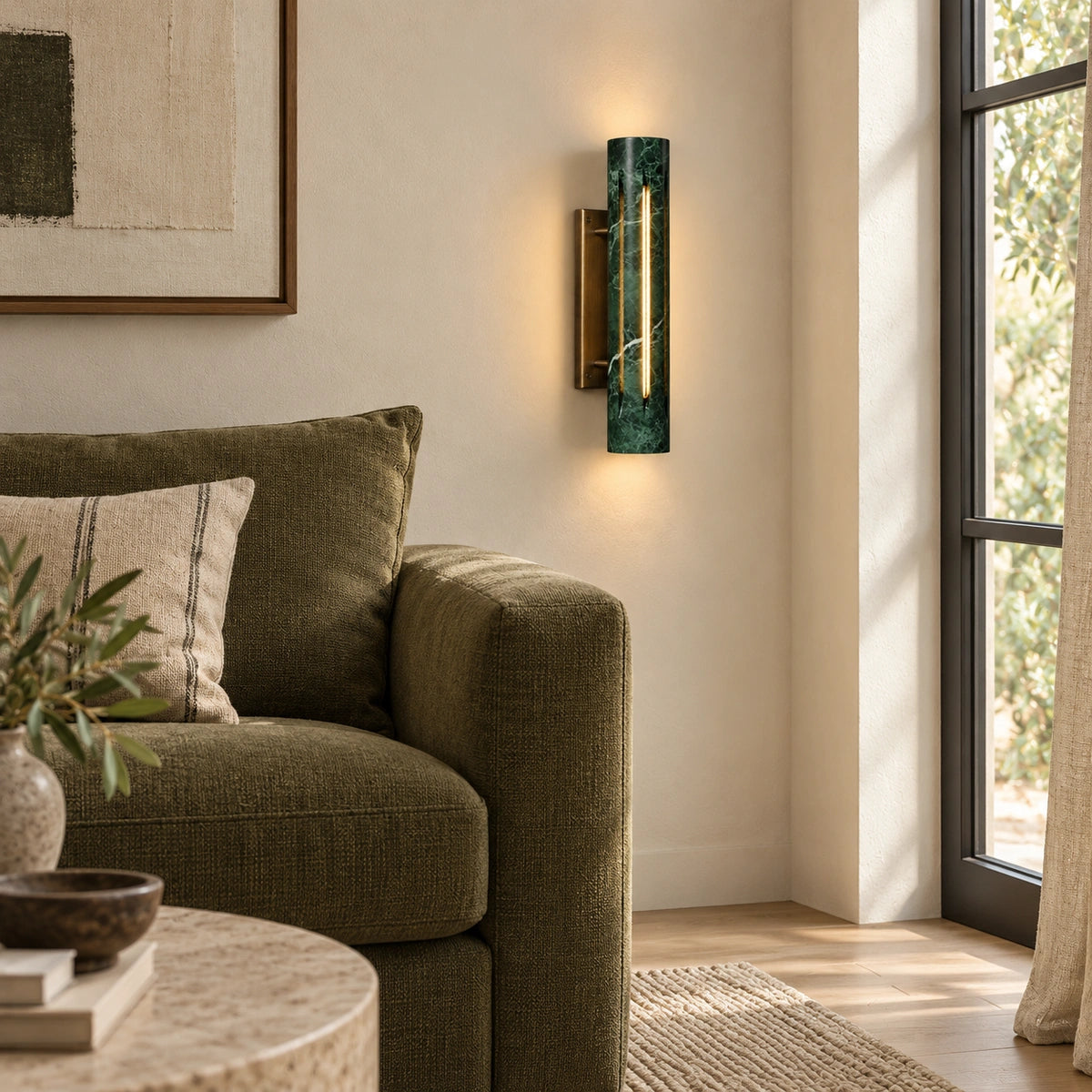 Cylo Green marble wall lamp — styled living view with antique brass mount
