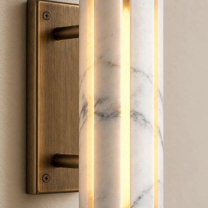 Cylo White marble wall lamp — styled detail view with antique brass mount