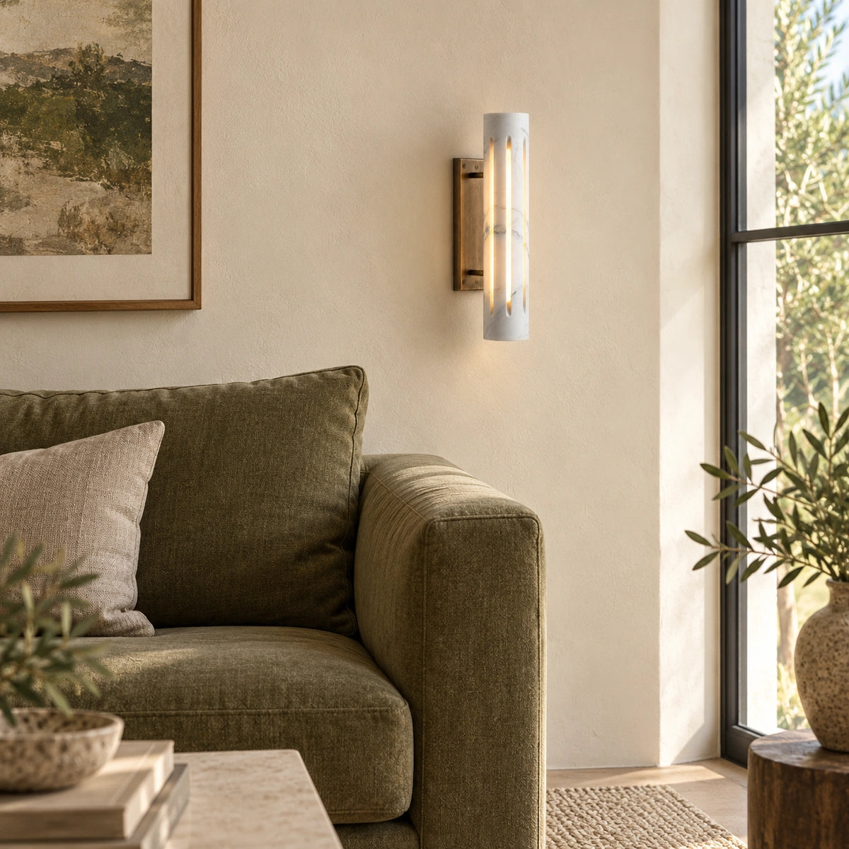 Cylo White marble wall lamp — styled living view with antique brass mount