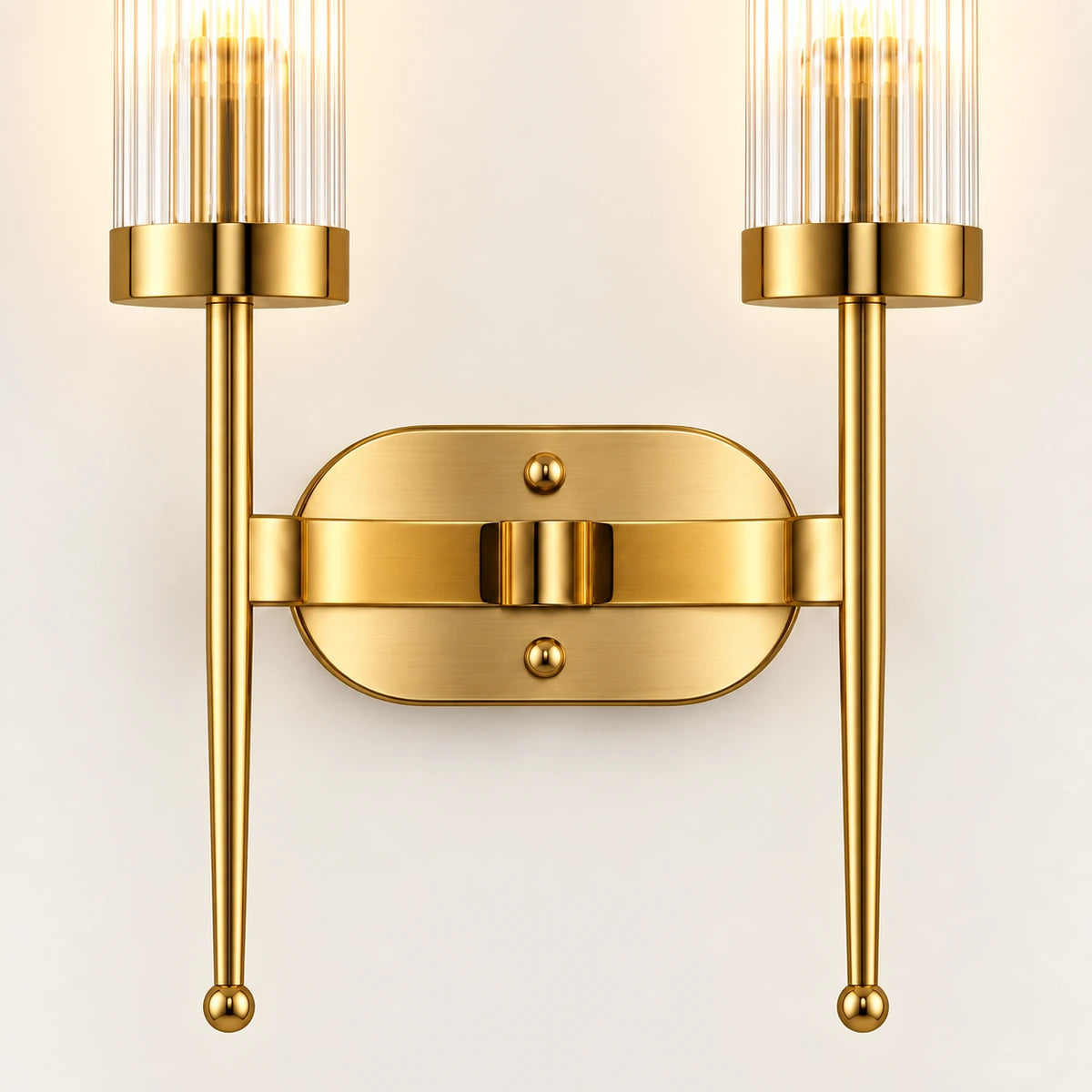 Close-up of both ribbed glass cylinders, brass collars, twin rods and capsule wall plate