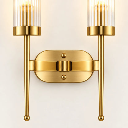 Close-up of both ribbed glass cylinders, brass collars, twin rods and capsule wall plate