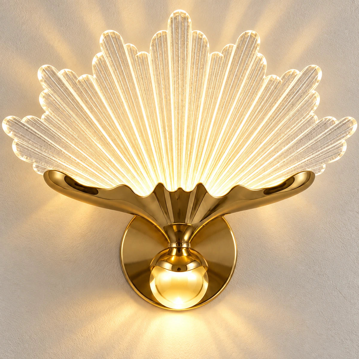 Close-up of clear grooved acrylic blades, gold support and central globe