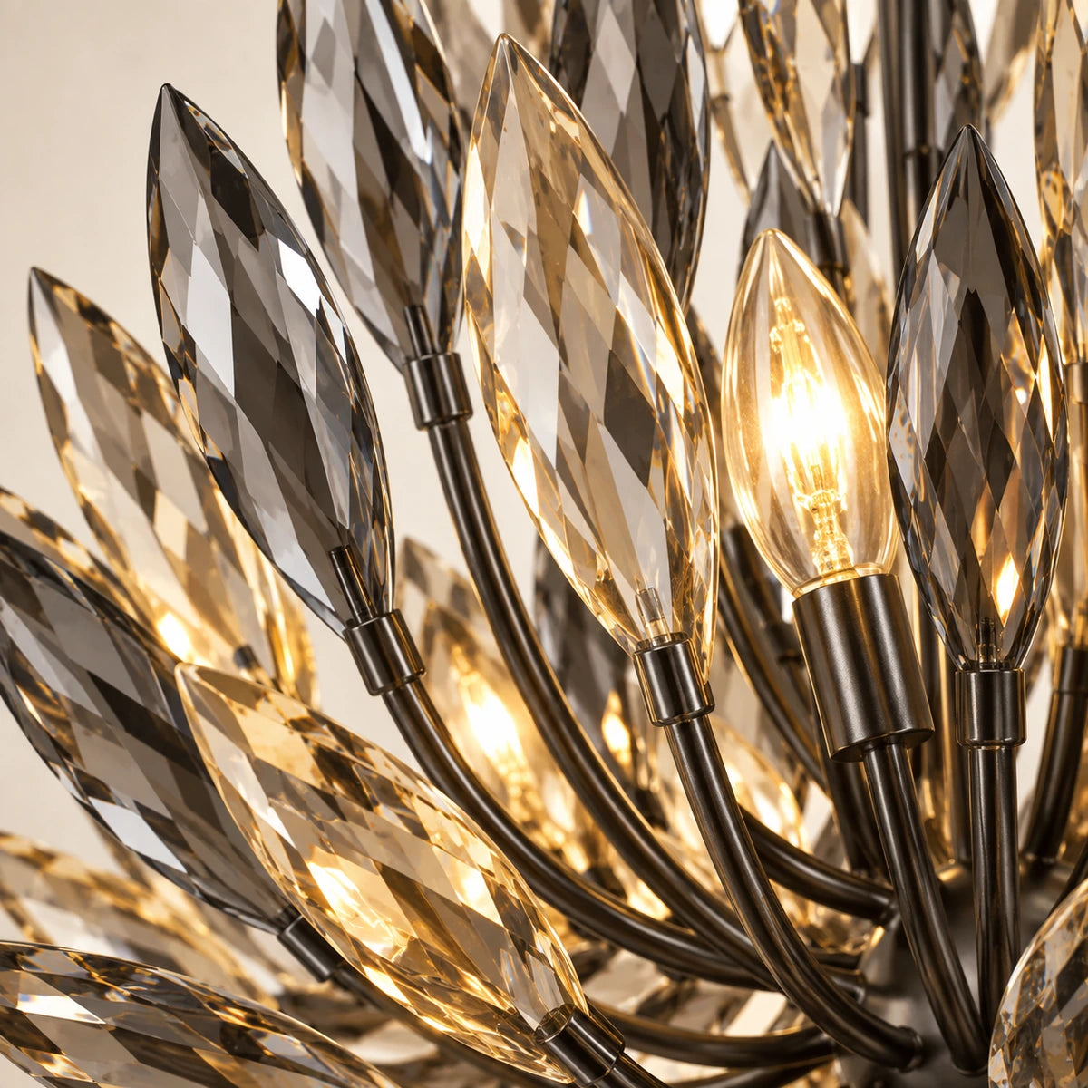 Close-up of smoke and amber crystal leaves on the black iron frame
